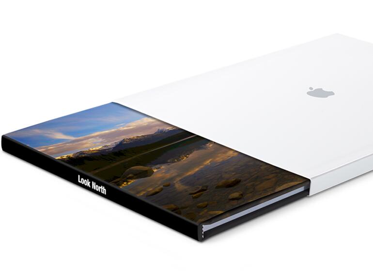 Apples Fotobücher werden in einem eleganten Umschlag geliefert und sind sehr hochwertig verarbeitet. Es ist jedoch vor allem die Integration in iPhoto, die die Apple-Bücher reizvoll macht.