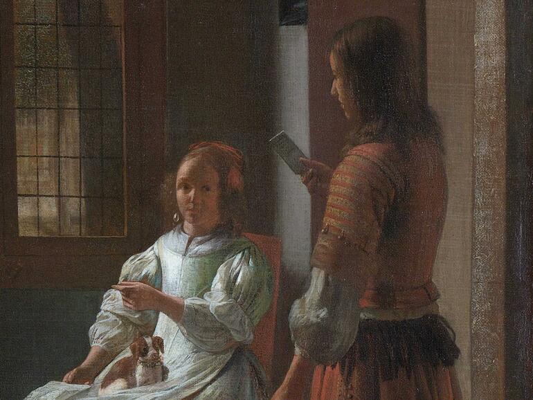 Man Handing a Letter to a Woman in the Entrance Hall of a House.