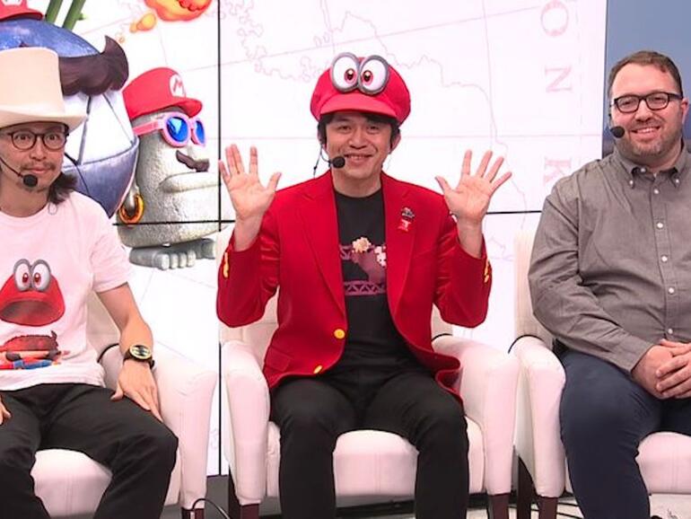 Entwickler Koizumi wurde mit einem „Donkey Kong&quot;-Retroshirt gesichtet und verteilte Pins mit ähnlichen Motiven