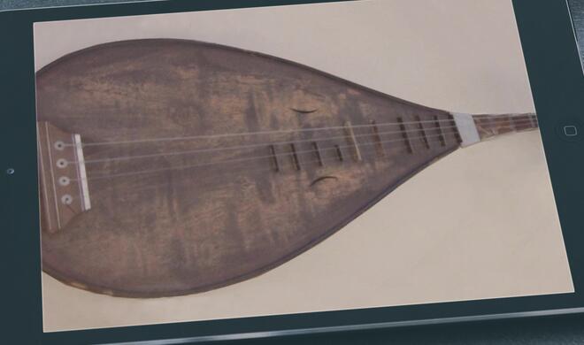 Montage: Chinesische Pipa auf dem iPad.