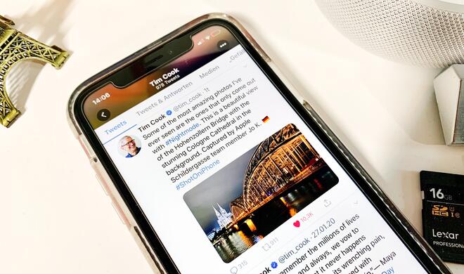 Apple-Chef twittert ein Foto eines Apple Store-Mitarbeiter aus Köln und lobt den iPhone Nachtmodus. 